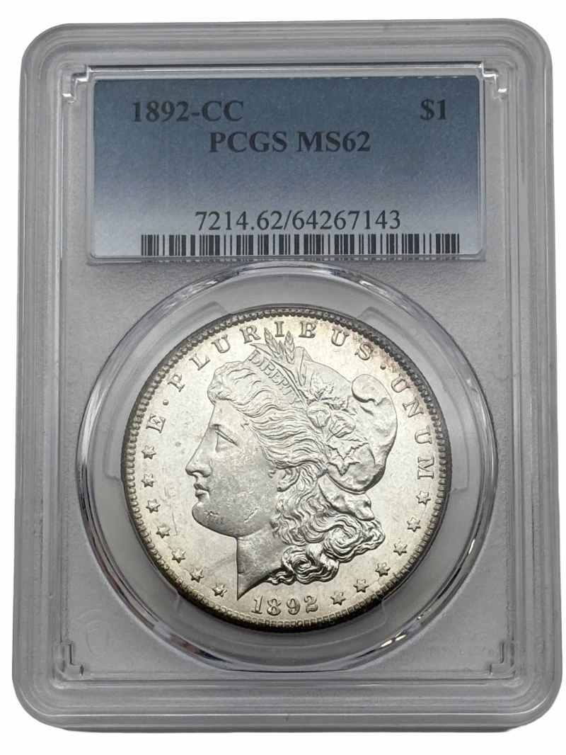 1892-CC Morgan Silver Dollar $1 PCGS MS62, Carson City Mint, strong luster and reflective surfaces.
